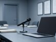 Private meeting room scene with a conference microphone and a laptop showing a privacy screen, suggesting confidential, controlled-access discussions.